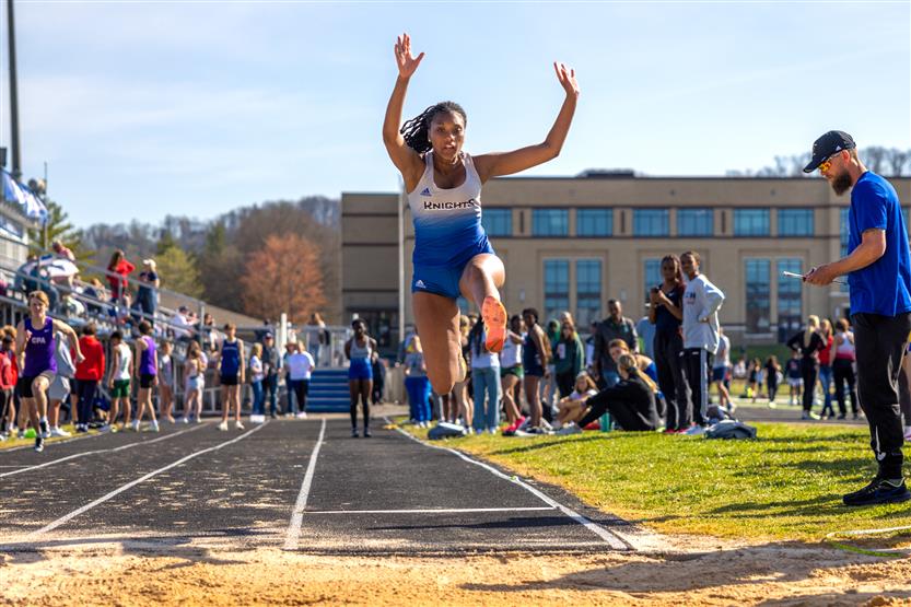 Students run in track and field